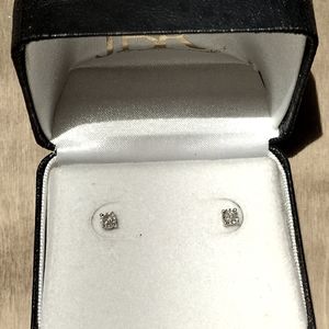 1/10 Carat Sterling Silver Diamond Studs.